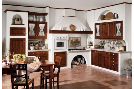 Cucina classica in muratura con elettrodomestici incassati nel muro, ante in pregiato legno scuro, pomelli in ceramica, finiture su richiesta Comp 04 di Arrex